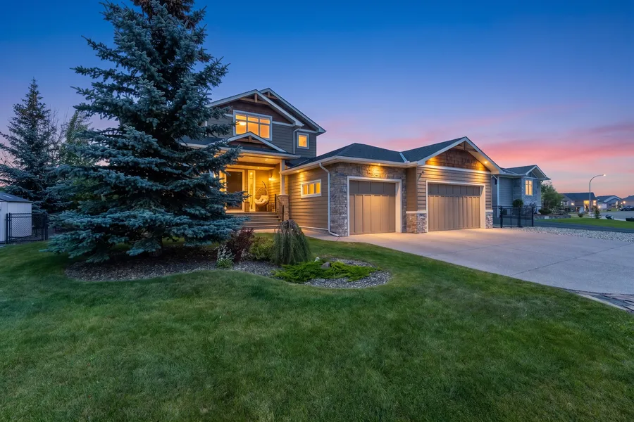 Twilight elevation, stone accents and triple garage