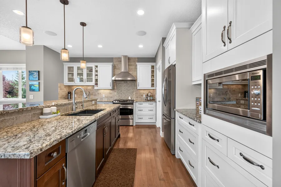 Maple cabinetry, stainless appliances