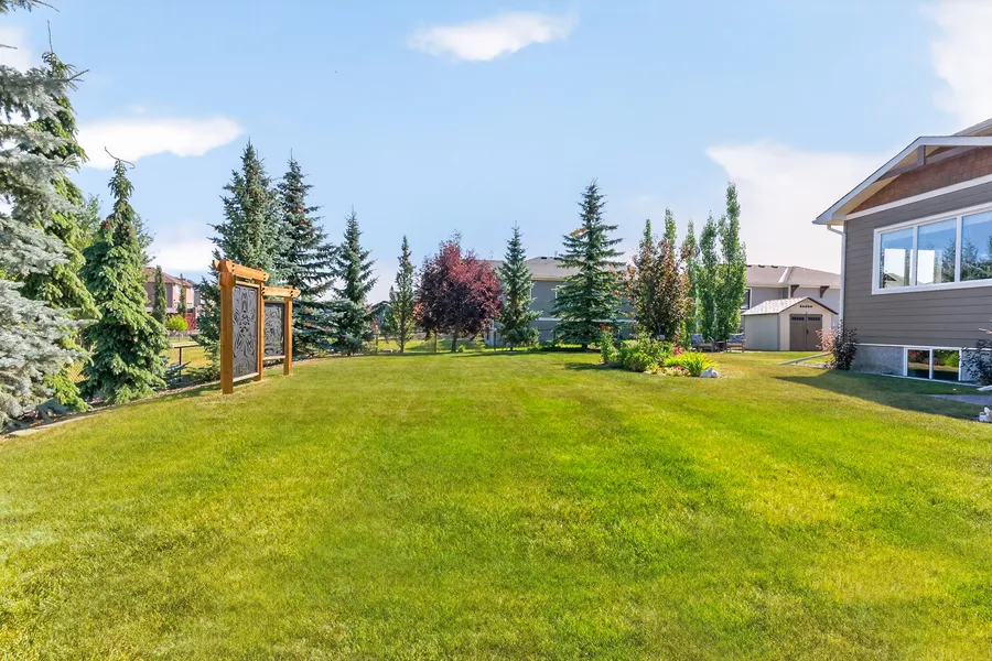 Backyard grounds and pergola accent