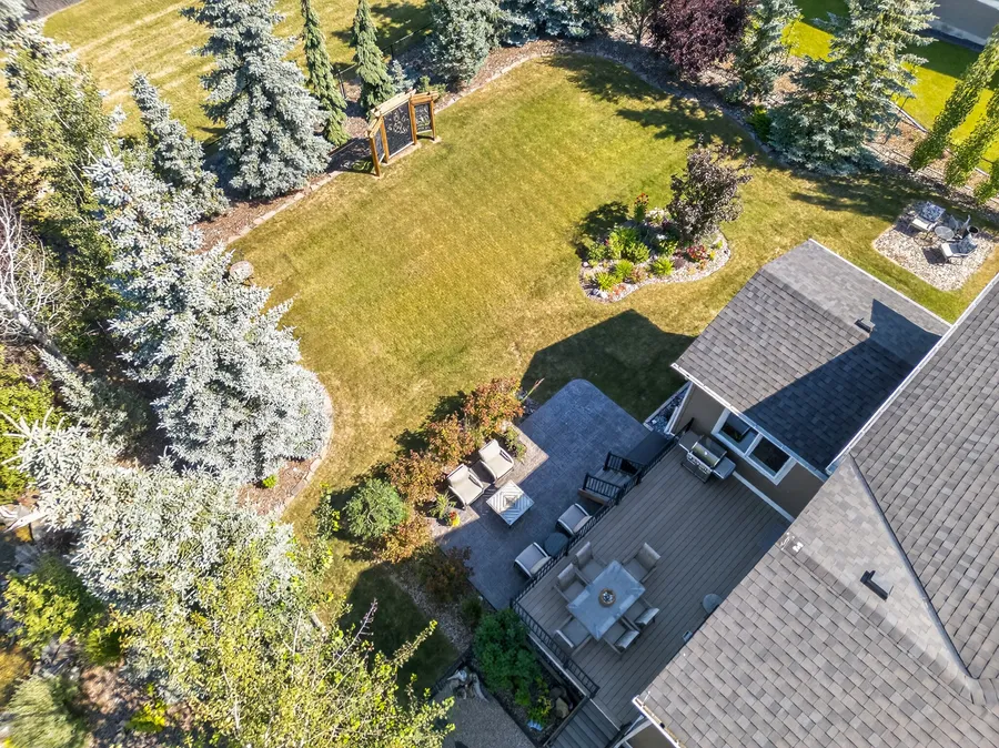 Aerial view of the deck and landscaped yard