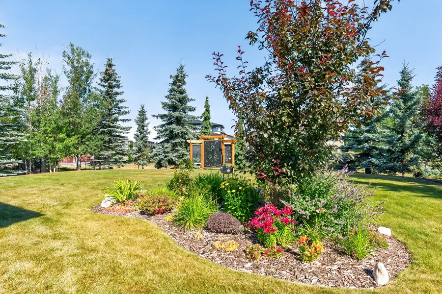 Perennial garden bed and pergola accent